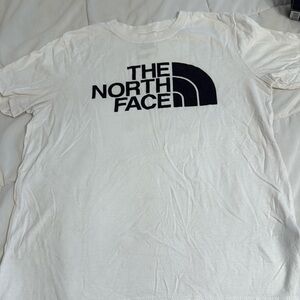 White north face shirt. A little wrinkled can iron before shipping.
